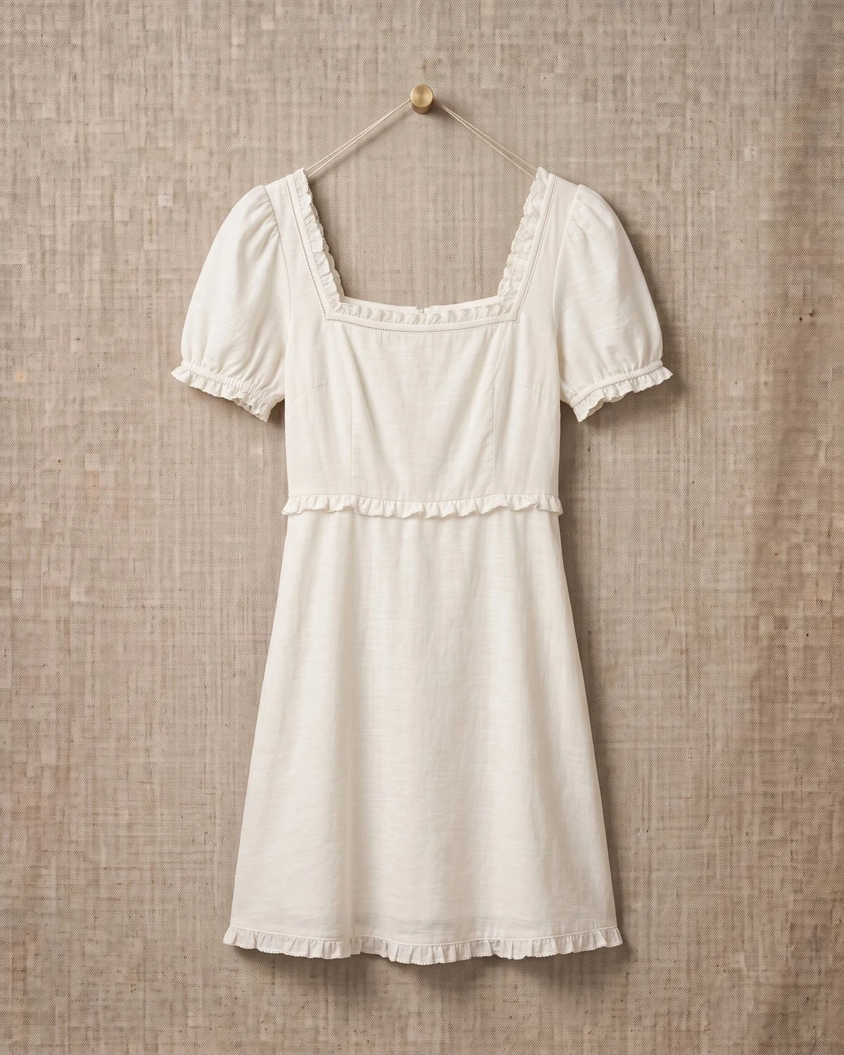 Vestido Amélie — Vestido corto de algodón con manga abullonada.