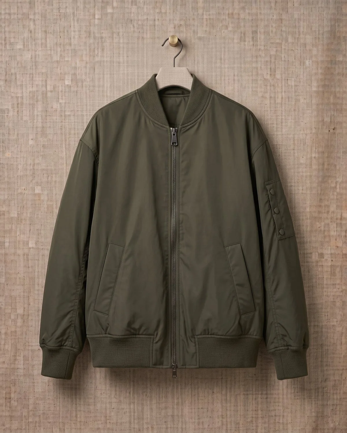 Bomber Sauge — Campera bomber liviana con cierre metálico.
