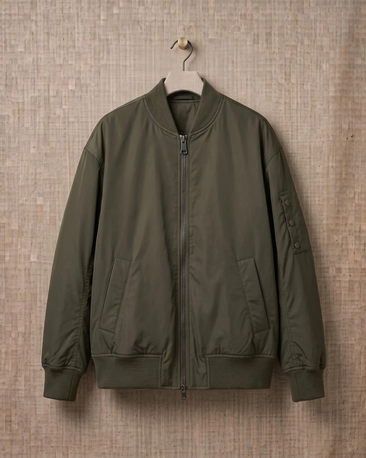 Bomber Sauge — Campera bomber liviana con cierre metálico.